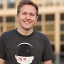 a white skinned man without beard